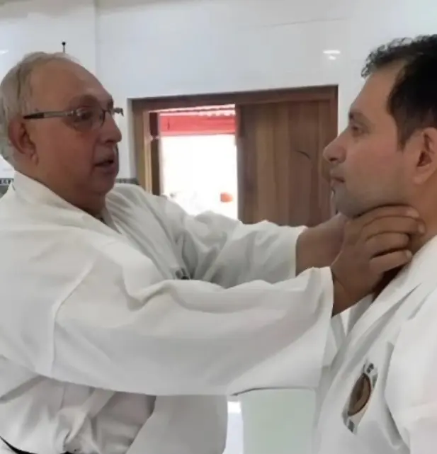 Sensei Hoshi P. Batliwala and Sensei Percy Batliwala demonstrating a self-defense technique at the O.G.K.S India karate class in Worli, Mumbai